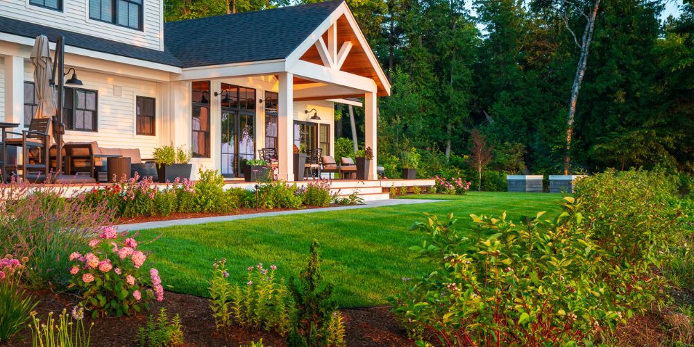 healthy lawn and plantings in front of home