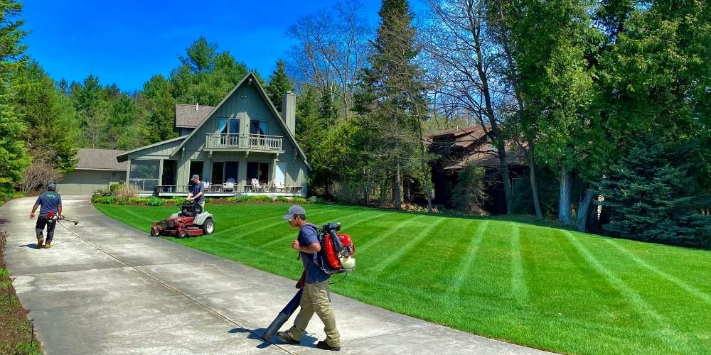 lawn-maintenance-crew-mows-and-blows-turf